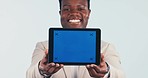 Green screen, tablet and face of black man in studio with service, platform or offer in white background. Digital, news and portrait of entrepreneur with sign up, launch or guide, faq or presentation