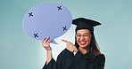 Happy woman, student and pointing to speech bubble for graduation, feedback or comment against a studio background. Portrait of female person or graduate with shape for social media on mockup space