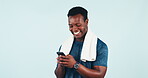 Reading, meme and man with phone and fitness on blue background in studio with social media, post or online joke. Sports, athlete or person laughing with cellphone and funny communication on internet