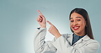 Woman, hands and happy scientist pointing in studio background with promotion or presentation of information. Science, portrait and person show mockup with advice, review or menu option in laboratory