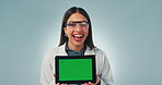 Woman, researcher and tablet green screen with safety glasses for technology, blue studio background and digital innovation. Online, advertising and excitement for mockup, information and agreement