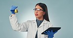 Doctor, tablet and problem solving with a science woman in studio on a gray background for research or innovation. Medicine, technology and reaction with a young scientist working on a breakthrough