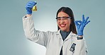 Doctor, perfect and reaction with a science woman in studio on a gray background for research or innovation. Portrait, medicine and biology with a happy young scientist working on a breakthrough