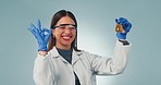 Doctor, smile and okay with a science woman in studio on a gray background for research or innovation. Portrait, sample and perfect chemical reaction with a happy young medical scientist at work