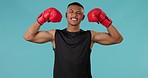 Man, fitness and strong boxer in martial arts, training or fighting practice against a studio background. Portrait of male person, athlete or fighter with boxing gloves for sports or self defense