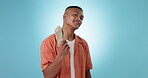 Cash, money fan and portrait of a man in studio as winner for competition, lottery or award. Happy person on a blue background with investment cashback, financial freedom or savings and bonus prize