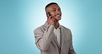 Business man, phone call and communication for career opportunity, networking and financial advice in studio. Young african worker, accountant or advisor talking on mobile in suit on blue background