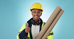 Face, happy engineer and man thumbs up in studio for success, ok and construction agreement. Portrait, architect smile and like hand with blueprint for building approval isolated on blue background