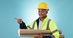 Construction worker, blueprint and man is pointing at list for professional contractor info on blue background. Floor plan, architecture and menu, steps for engineering project in studio and guide