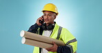 Architect, plan and phone call of a man in studio for communication and project management. Engineer, technician and construction worker with blueprint, networking and smartphone on blue background