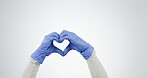 Heart hands, healthcare and doctor with support and trust, cardiology and emoji isolated on white background. Wellness, healthy and medical care with person in studio for help, charity and love sign