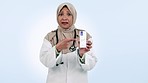 Doctor, muslim woman and talking of medicine product in studio for healthcare and wellness. Hijab, mature and medical professional person with a box, portrait and presentation on a white background