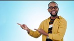 Black man, pointing and laughing  face with decision for promotion, checklist and presentation for deal and choice. Blue background, studio and happy model with information and announcement of promo