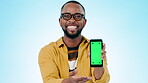 Phone mockup, green screen and black man with advertising, app design and ads isolated on blue background. Tracking marker, UI and information on website with social media and marketing in studio