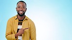 Pointing, banner and face of black man on blue background for promotion, advertising and choosing. Mockup, happy and portrait of person with hand gesture for option, agreement and decision in studio