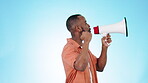 Black man with megaphone at protest and fight, politics with human rights and profile on blue background. Communication, equality and movement, empowerment and activism with call for action in studio