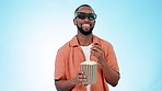 Man, 3d glasses and laugh with popcorn in studio, comedy movie or joke by blue background. African guy, eating snack or holographic vision for comic show, crazy film or smile in cinema, theater or tv