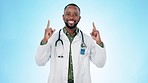 Healthcare, hand pointing and face of man doctor in studio with yes, contact us or info on blue background. Hospital, presentation and portrait of African male nurse with advice emoji show faq promo