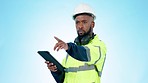 Black man, architect and tablet in construction inspection or management against a studio background. African male person, engineer or contractor working on technology for architecture plan or ideas