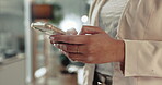 Business woman, hands and typing with smartphone in office for social media, mobile contact and digital chat. Closeup of employee scroll on phone, download app and search information for networking