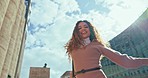 Happy, dance and business woman in city excited for career, job and work by office building. Professional, happiness and portrait of worker in urban town for success, freedom and celebrate promotion