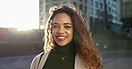 Smile, face and woman in the city in the morning for travel, business or work. Happy, working and portrait of a young employee or worker in a town for commute, professional career or positi attitude