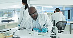 Results, teamwork or scientist writing research notes for analysis on experiment or medical information. Notebook, black man or expert in laboratory with documents advice for science development info