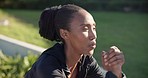 Fitness, squat and black woman doing workout in nature for strength, weight loss and body training. Sports, wellness and young African female athlete doing exercise at an outdoor park or field.