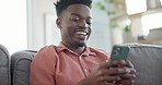 Relax, laugh and black man on sofa with phone for social media meme, internet joke and funny message. Home, happy and person on smartphone with smile for humor, comedy and online chat in living room