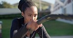 Fitness, battle ropes and black woman doing workout in nature for strength, weight loss and body training. Sports, wellness and young African female athlete doing exercise at an outdoor park or field