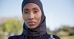 Fitness, serious and face of Muslim woman in city for workout, training and exercise outdoors. Sports, determined and portrait of Islamic person with hijab in town for wellness, health and motivation