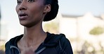 Running, morning and a black woman for fitness in the street for cardio, sports or a marathon. Park, health and an African runner or female athlete with wellness, exercise or training for a race