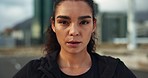 Sports, breathe and face of woman in the city for race, marathon or competition training. Serious, fitness and portrait of young female athlete runner on a break for running cardio workout in town.