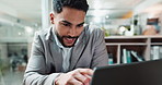 Laptop, research and smile with a business man at work in his office for a project management report. Computer, email and information with a happy young employee reading communication in the office