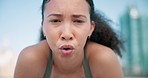 Sports, breathe and face of woman in the city for race, marathon or competition training. Fitness, rest and portrait of young female athlete runner sweating on a break for cardio workout in town.