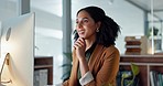 Happy woman at computer in office, thinking and reading email, feedback review or article at digital agency. Internet, research and girl at tech startup networking, writing report or admin project.