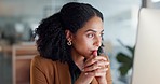 Woman at computer in office, thinking and reading email, feedback review or web article at digital agency. Internet, research and girl at tech startup networking, business schedule or admin project.