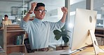 Computer, success and a business asian man in celebration of a target, goal or deal at his workplace. Winner, wow or promotion bonus with an excited young employee spinning in a chair at the office