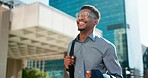 Business, happy and walking black man on city journey, commute trip and realtor smile on way to office building. Happiness, career expert and African real estate agent on morning travel in Nigeria