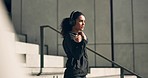 Woman on steps for exercise, warm up with headphones in muscle workout and city morning body training. Urban fitness, power and performance, girl on stairs with music, stretching and outdoor sports.