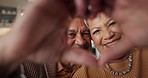 Face, happy and senior couple with heart hands for love, commitment and together in marriage. Smile, care and portrait of elderly man and woman with a gesture for trust with an emoji icon in a house