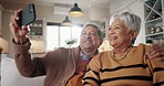 Senior couple, selfie and smile on couch, hug and bonding with love, check post and relax in retirement in home. Elderly woman, man and laugh with profile profile, web blog and social media on sofa