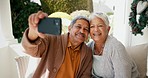 Selfie, happy and a senior couple in a garden for social media, bonding and a memory. Smile, technology and an elderly man and woman taking a photo on a mobile on a backyard home sofa for love