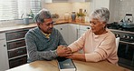 Senior couple, prayer and bible in home, holding hands and support for hope, mindfulness and peace. Elderly woman, old man and together with book, spiritual growth and gratitude to worship God