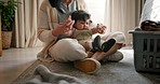 Home, mother and baby on the floor, love and bonding with relationship, newborn and family in a living room. Mom, child and kid with mama on the ground, apartment and connect in a lounge with crying