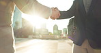 Teamwork, closeup or business people shaking hands in city for project agreement or b2b deal. Hiring, outdoor handshake or men meeting for a negotiation, offer or partnership opportunity on rooftop