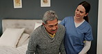 Senior, man and nurse for help, support and caregiver with homecare in bedroom of nursing home and conversation. Elderly, professional and medical worker helping up person from bed in house and chat
