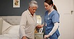 Old woman, nurse with help or support, senior care with health and wellness in homecare with morning routine. Caregiver, person with disability or patient with rehabilitation, trust and healthcare