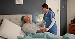 Mature, woman and patient with nurse in bedroom for assistance, comfort or recovery in health. Elderly, person and  happy for care, consultation or help in retirement, rehabilitation or medical staff