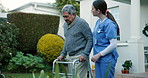 Walker, walking and caregiver help senior man at a retirement home as support and care in a backyard. Movement, recovery and nurse with elderly person for rehabilitation at outdoor house for health